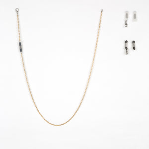 New York: gold and rhodium necklace and glasses chain